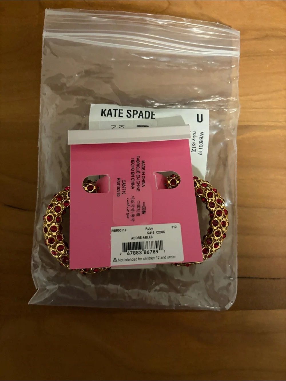 kate spade Gold Hoop Earrings with Red Crystal Accents